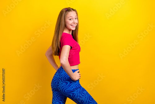 Slika na platnu Photo of young funny sportive teenager girl wearing new blue print leggings prom