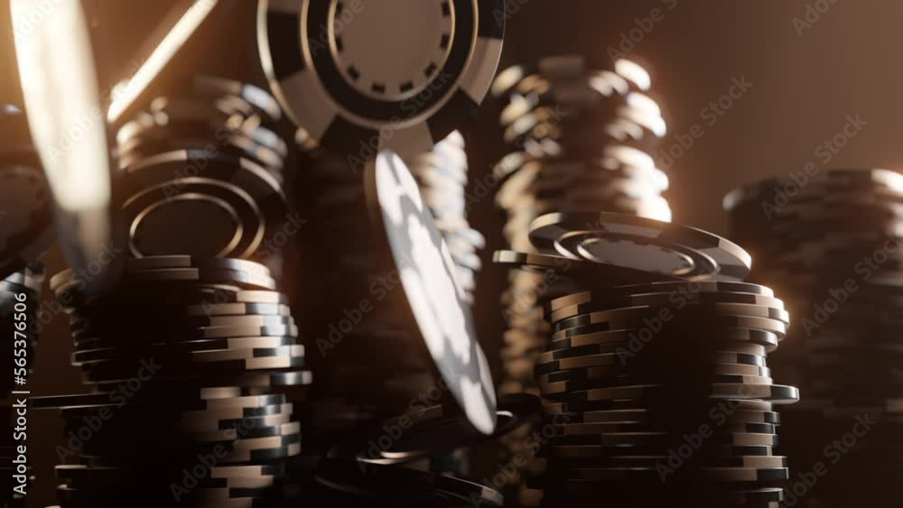 Golden poker chips and dice are falling in slow motion. Online casino betting or blackjack gambling concept. Luxury background