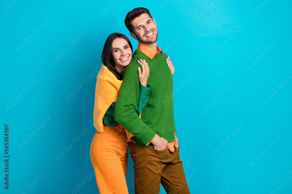 Photo of two people sweethearts cozy cuddle true love concept isolated on blue color background Photo of two people sweethearts cozy cuddle true love concept isolated on blue color background