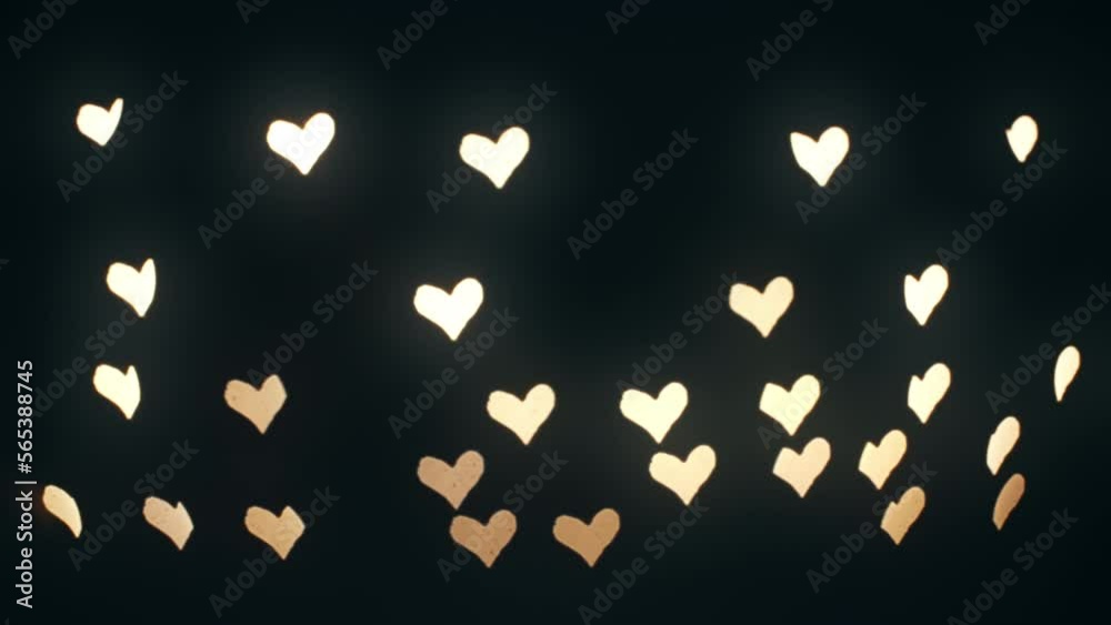 Abstract bokeh background made of defocused hearts. 