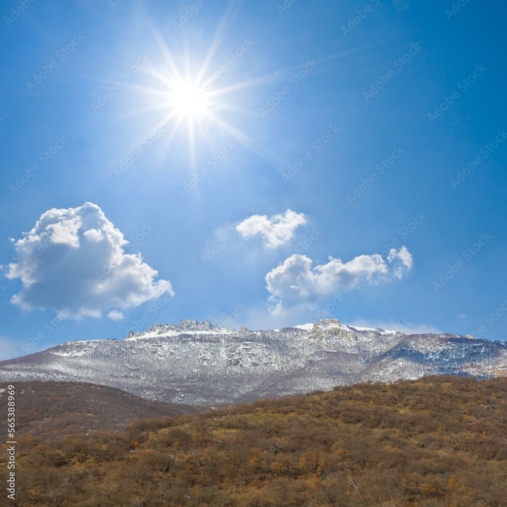 snowbound mountain ridge  at sunny day, winter mountain travel scene