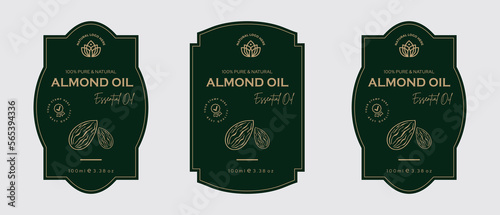 Almond oil label design cosmetic products label for skin care and beauty, herbal ingredients. Almond Labels with sketches, and package emblem. Green gold premium vector illustration.