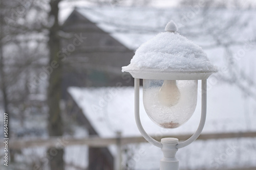 Little white snow-covered lantern