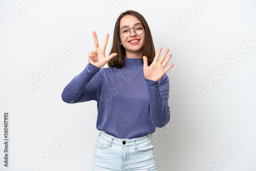 Young Ukrainian woman isolated on white background counting eight with fingers