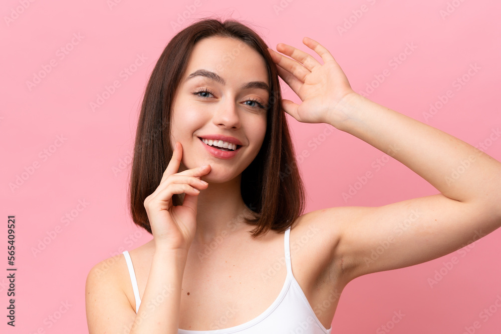 Young Ukrainian woman isolated on pink background . Portrait Young Ukrainian woman isolated on pink background . Portrait