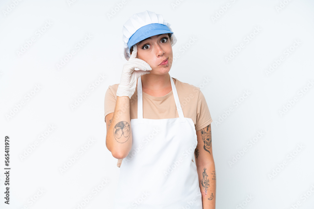 Fishmonger wearing an apron and holding a raw fish isolated on white background thinking an idea