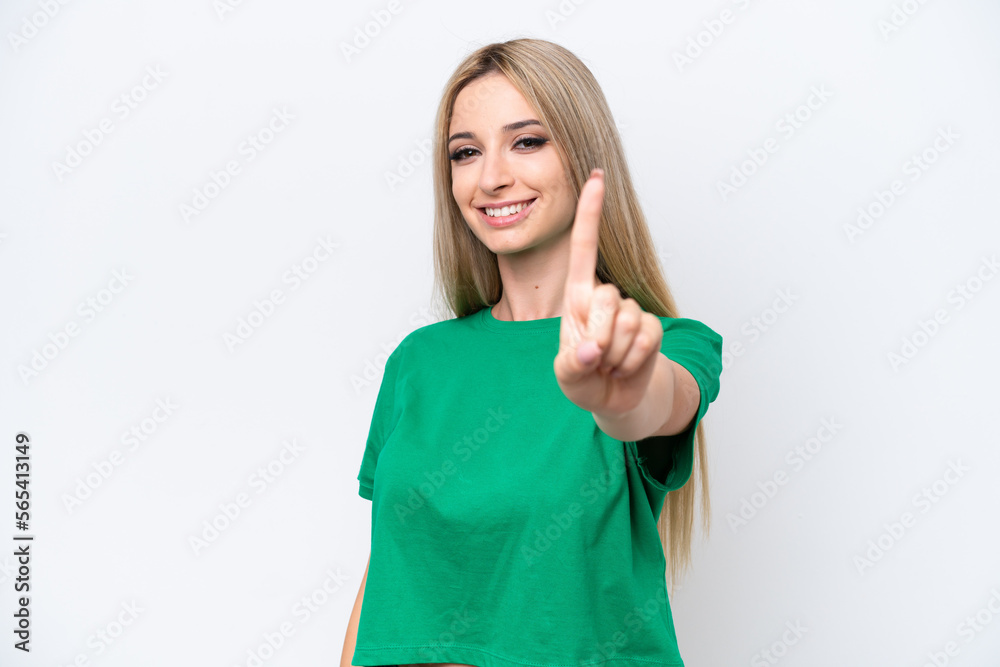Pretty blonde woman isolated on white background showing and lifting a finger Pretty blonde woman isolated on white background showing and lifting a finger