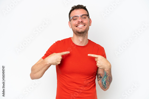 Young caucasian handsome man isolated on white background with surprise facial expression © luismolinero