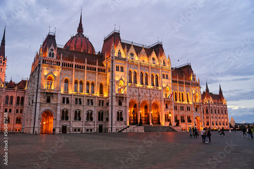 Hungarian Parliament Building in the evening at the Danube river in Budapest, Hungary © Dima Anikin