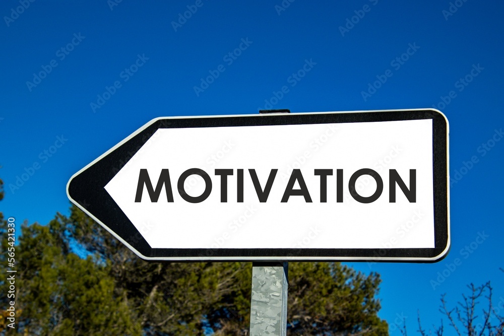 the word motivation written on a sign the word motivation written on a sign