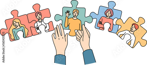 Hands joining puzzles with employees
