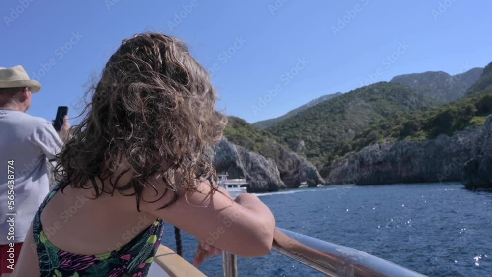Yacht trip. A teenage girl with flowing hair on a yacht. Travel and tourism at sea. Happy emotions. High quality FullHD footage Yacht trip. A teenage girl with flowing hair on a yacht. Travel and tourism at sea. Happy emotions. High quality FullHD footage