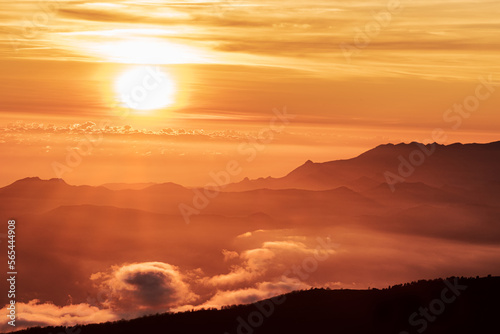 Landscape of the peaks of the Sierra de Tejeda,Almijara and Alhama between shadows and clouds at sunset seen from Sierra Nevada,Granada photo