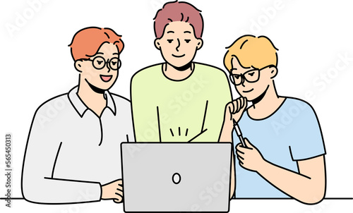 Male colleagues working together on laptop