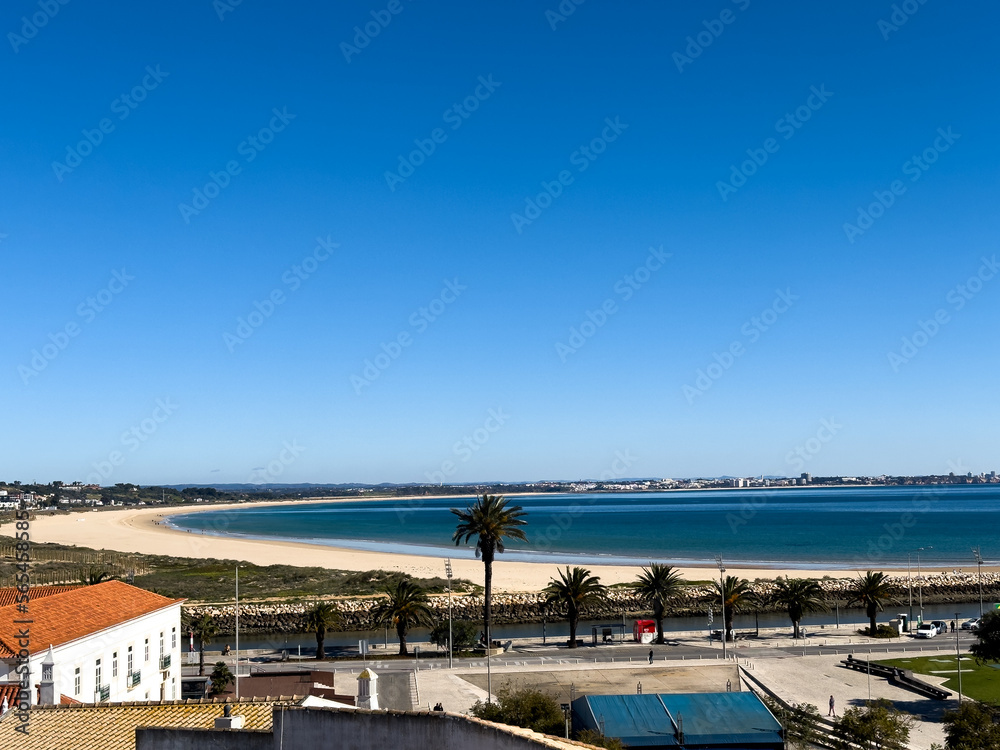 Old town in the center of Lagos, Algarve region, Portugal. Showing beach with blue skies