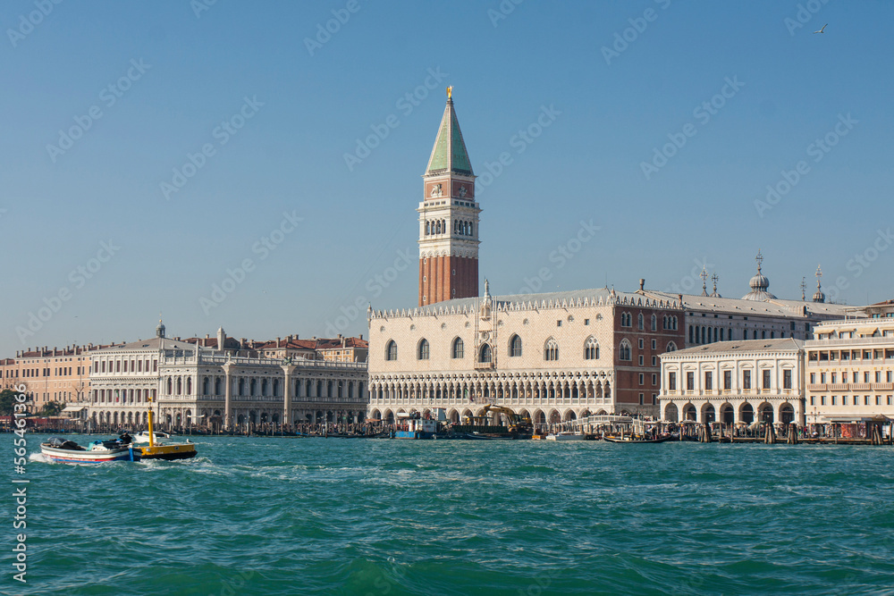 VENICE, ITALY - FEBRAURY , 2020: Doge's palace, Library and St. Marco tower from water.