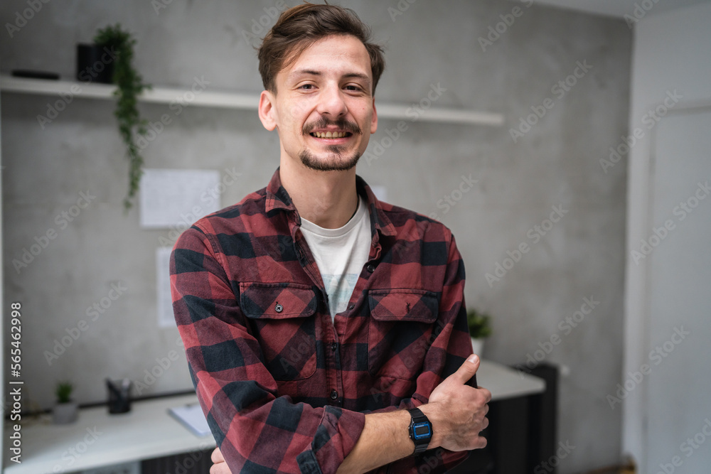 Obraz premium One man adult caucasian with mustaches and beard at work portrait