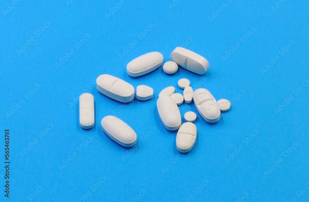 Set of drugs and pills on a blue background
