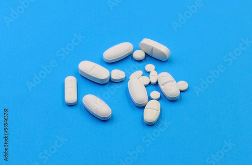 Set of drugs and pills on a blue background