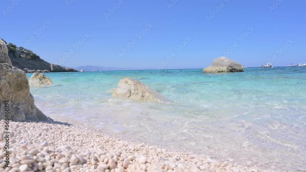 Blue beach in Sardinia. Italian coast, elite resorts. BLUE SKY AND CLEAR WATER. High quality 4k footage Blue beach in Sardinia. Italian coast, elite resorts. BLUE SKY AND CLEAR WATER. High quality 4k footage