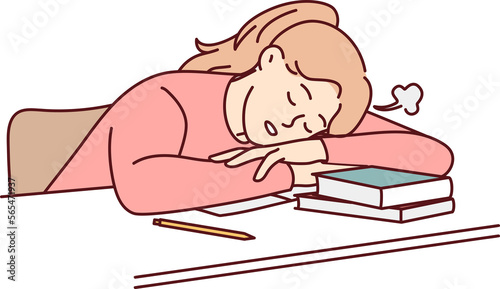 Exhausted student sleep on desk overwhelmed with studying