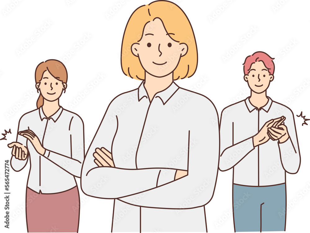 Smiling employees greeting successful businesswoman Smiling employees greeting successful businesswoman