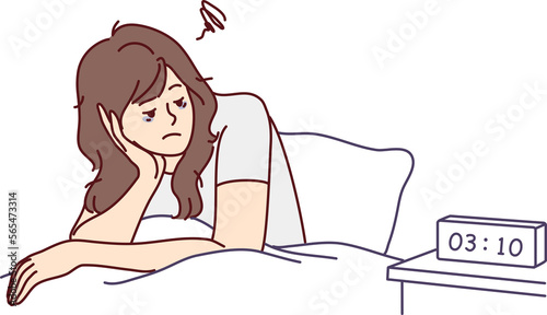 Exhausted woman sit in bed suffer from insomnia