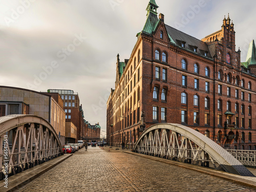 historic Red Brick Buildings and cobblestone streets bridge on St Annenfleet in Hamburg, Germany