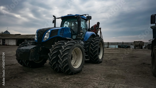 Fototapeta Naklejka Na Ścianę i Meble -  Blue tractor at the farm 