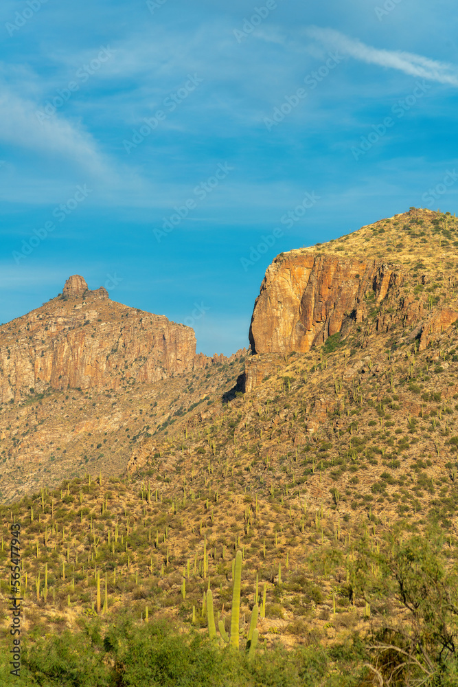 Towering moutain peaks and bluffs in the sonora desert in late afternoon in the hills of natural Arizona in wilderness