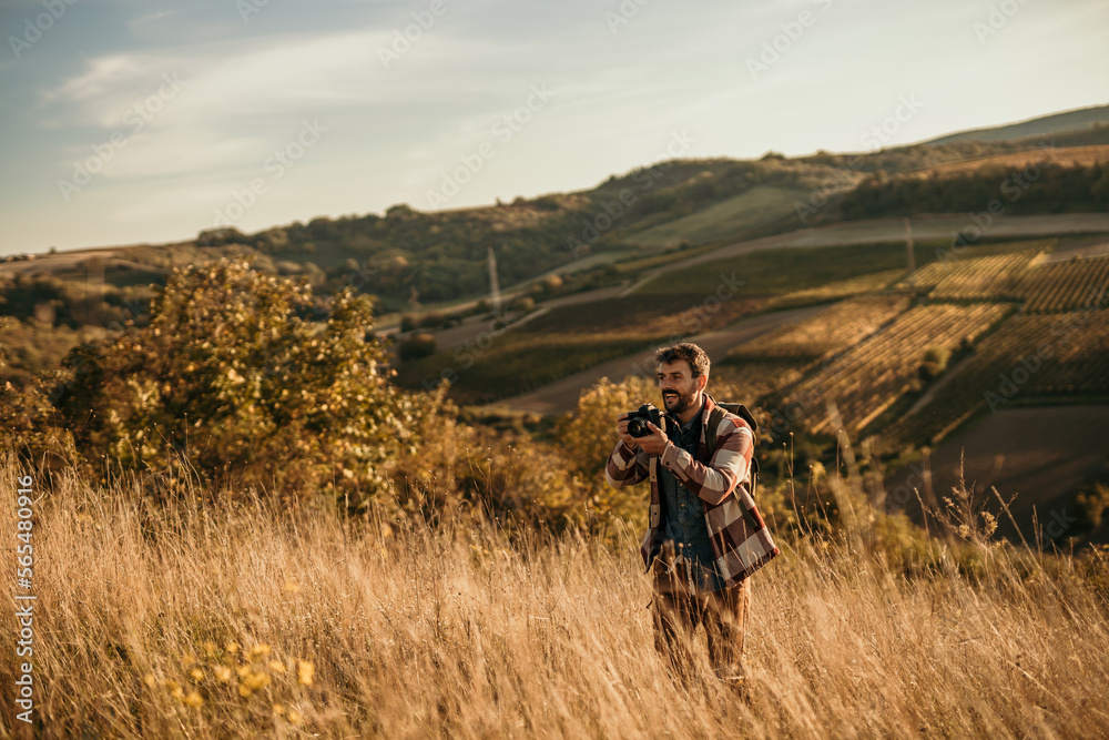 Shot of a young backpacker looking at a view during a hiking day in nature. Copy space.