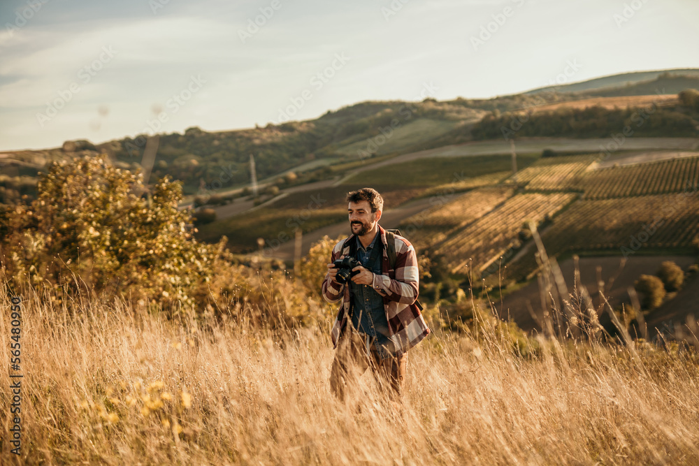 Shot of a young backpacker looking at a view during a hiking day in nature. Copy space.