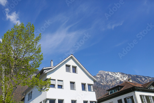 switzerland  an old house on the bank of a river in Switzerland  a house in the middle of the Swiss Alps