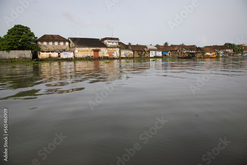 Water view of old waterfront houses. photo