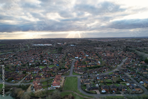 Aerial View of Residential Homes Near Tongwell Lake of Milton Keynes City of England Just Before Sunset. Drone's Camera Footage photo