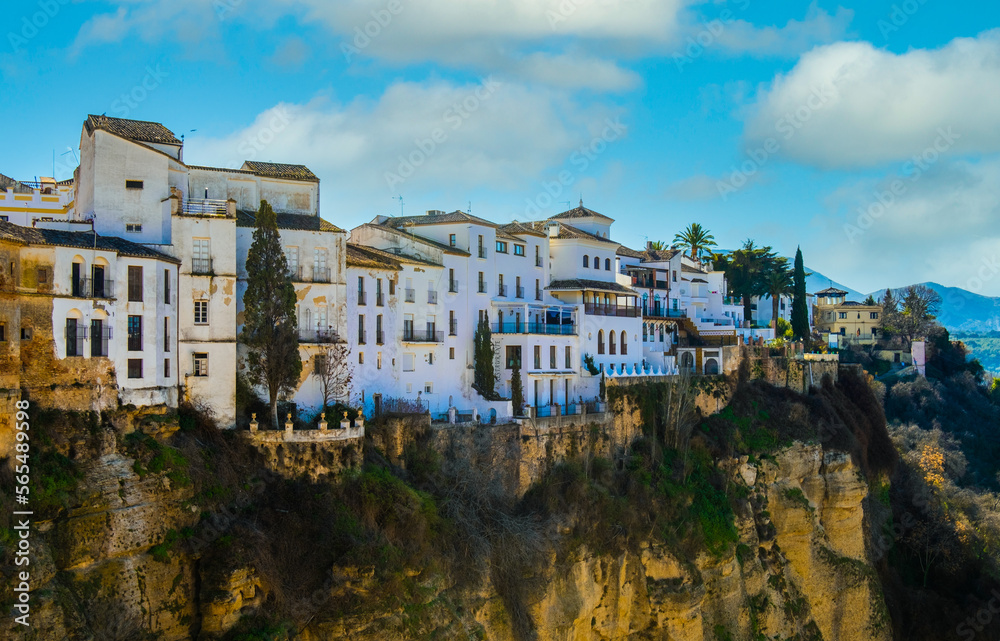 Houses built on the edge of the cliff, in the ancient city of Ronda, Spain
