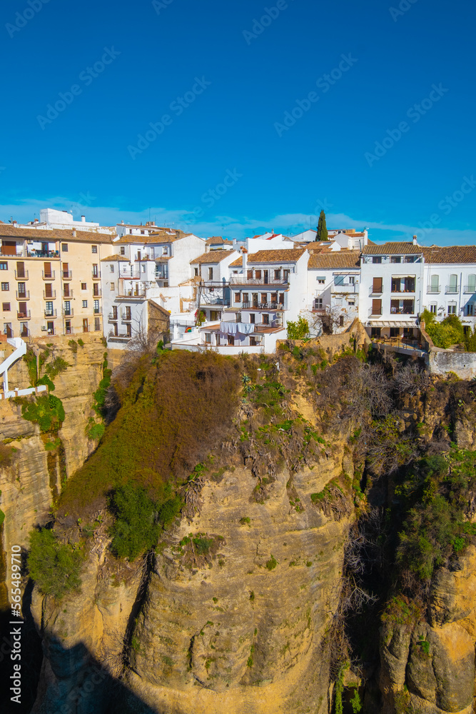 View of buildings on top of gorge in Ronda, SpainView of buildings on top of gorge in Ronda, Spain