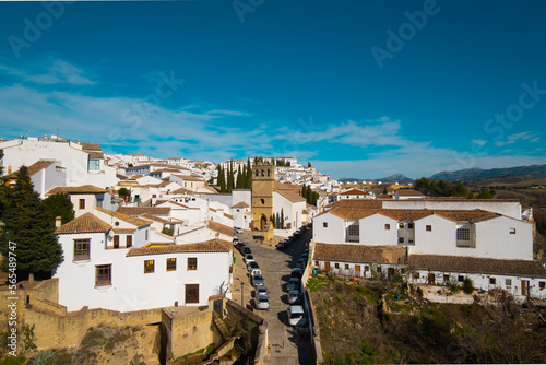 Beautiful aerial view of Ronda with bridge, church and houses