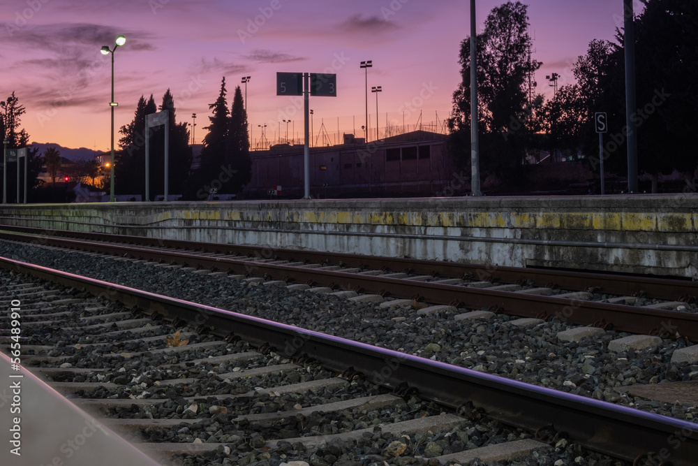 Fototapeta premium View of tracks at the train station in Ronda at night