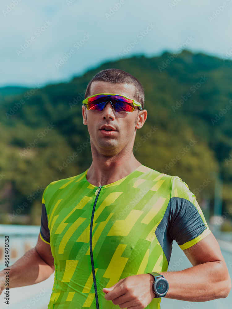 An athlete running a marathon and preparing for his competition. Photo of a marathon runner running in an urban environment An athlete running a marathon and preparing for his competition. Photo of a marathon runner running in an urban environment