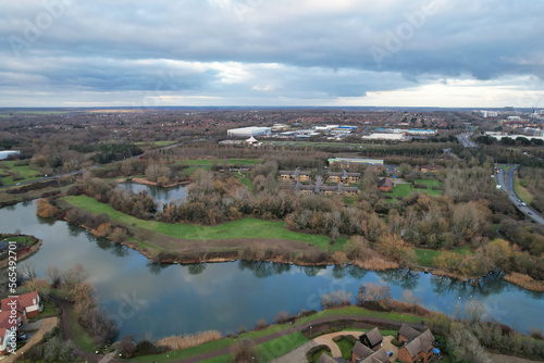 Aerial View of Residential Homes Near Tongwell Lake of Milton Keynes City of England Just Before Sunset. Drone's Camera Footage photo