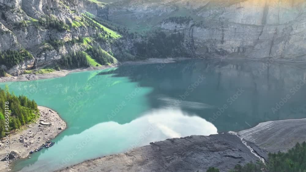 scenic turquoise lake in the Swiss Alps, Oeschinensee lake aerial view at sunrise, beautiful Swiss nature, travelling and tourism in Switzerland, wanderlust concept scenic turquoise lake in the Swiss Alps, Oeschinensee lake aerial view at sunrise, beautiful Swiss nature, travelling and tourism in Switzerland, wanderlust concept