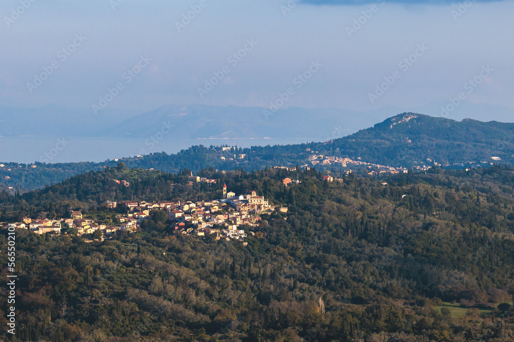 Corfu island view from Kaiser's Throne observation deck lookout, Pelekas village, Greece, Kaiser William II summit Observatory panoramic summer view with mountains, sea and Kerkyra in a background