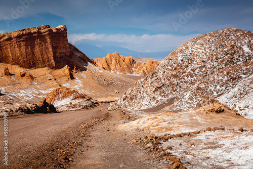 Dirt Road in Moon Valley dramatic landscape at Sunset, Atacama Desert, Chile