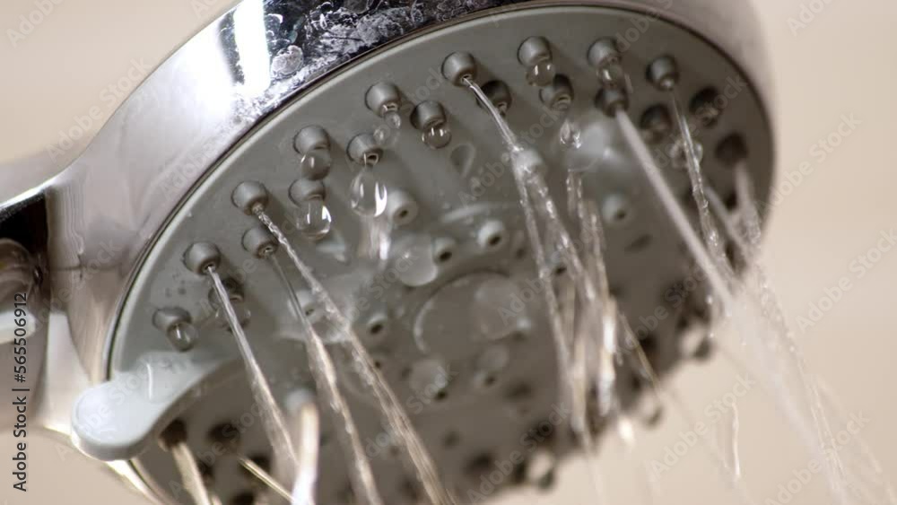 Water is coming from old shower head. Dirty clogged shower head, water