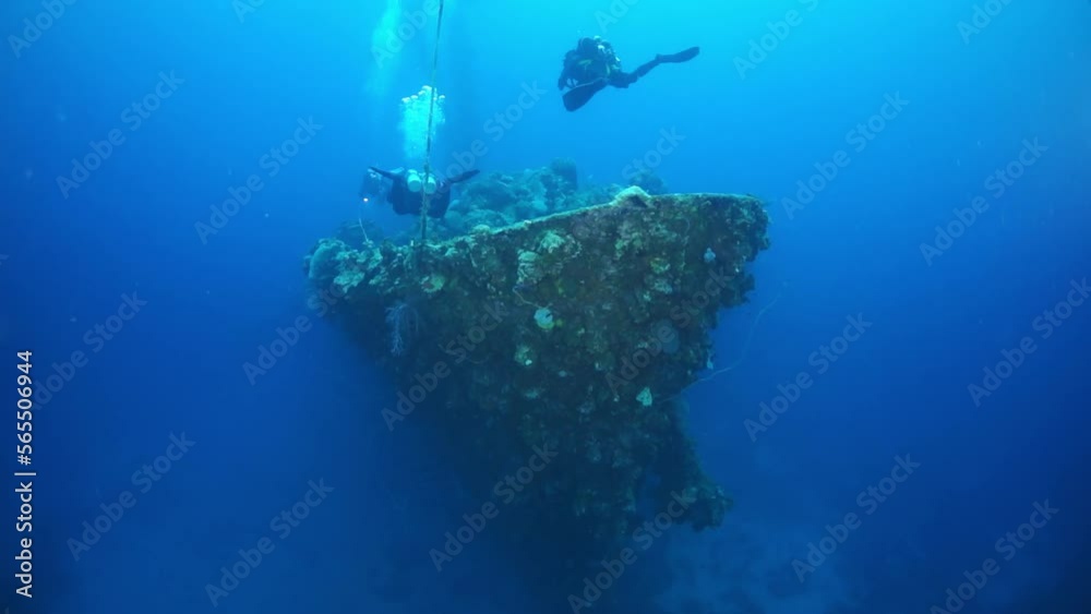 Diving in Truk Lagoon of shipwreck on Chuuk Islands. Ship wreck in sea life of Truk. Inside view of wreck in blue lagoon. Diving in Truk Lagoon of shipwreck on Chuuk Islands. Ship wreck in sea life of Truk. Inside view of wreck in blue lagoon.