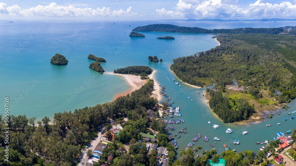 Fototapeta premium Aerial view of Noppharat Thara Beach and Khlong Son river on sunny day. Ao Nang, Krabi Province, Thailand.