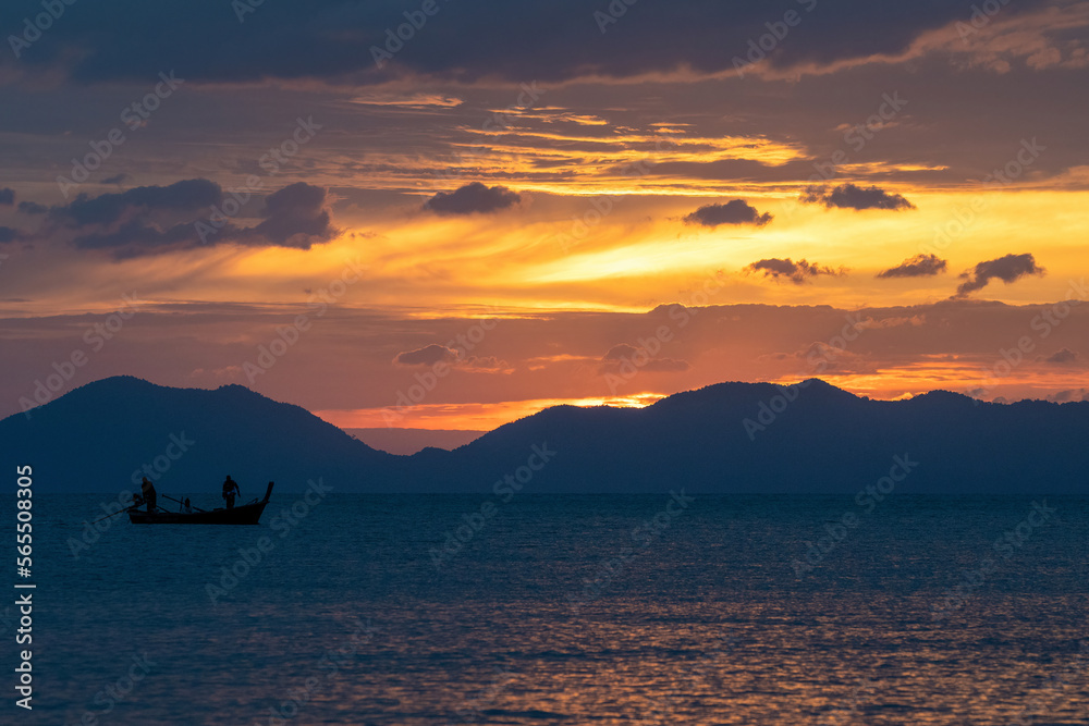 Sunset fishing in front of Ko Yao island. View from Klong Muang Beach. Krabi Province, Thailand.