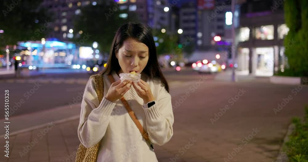 Woman eat mochi famous local street taiwanese dessert Woman eat mochi famous local street taiwanese dessert