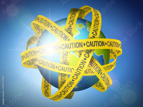 World globe with caution tape on sky